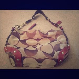 Tan Coach purse with Plum Leather